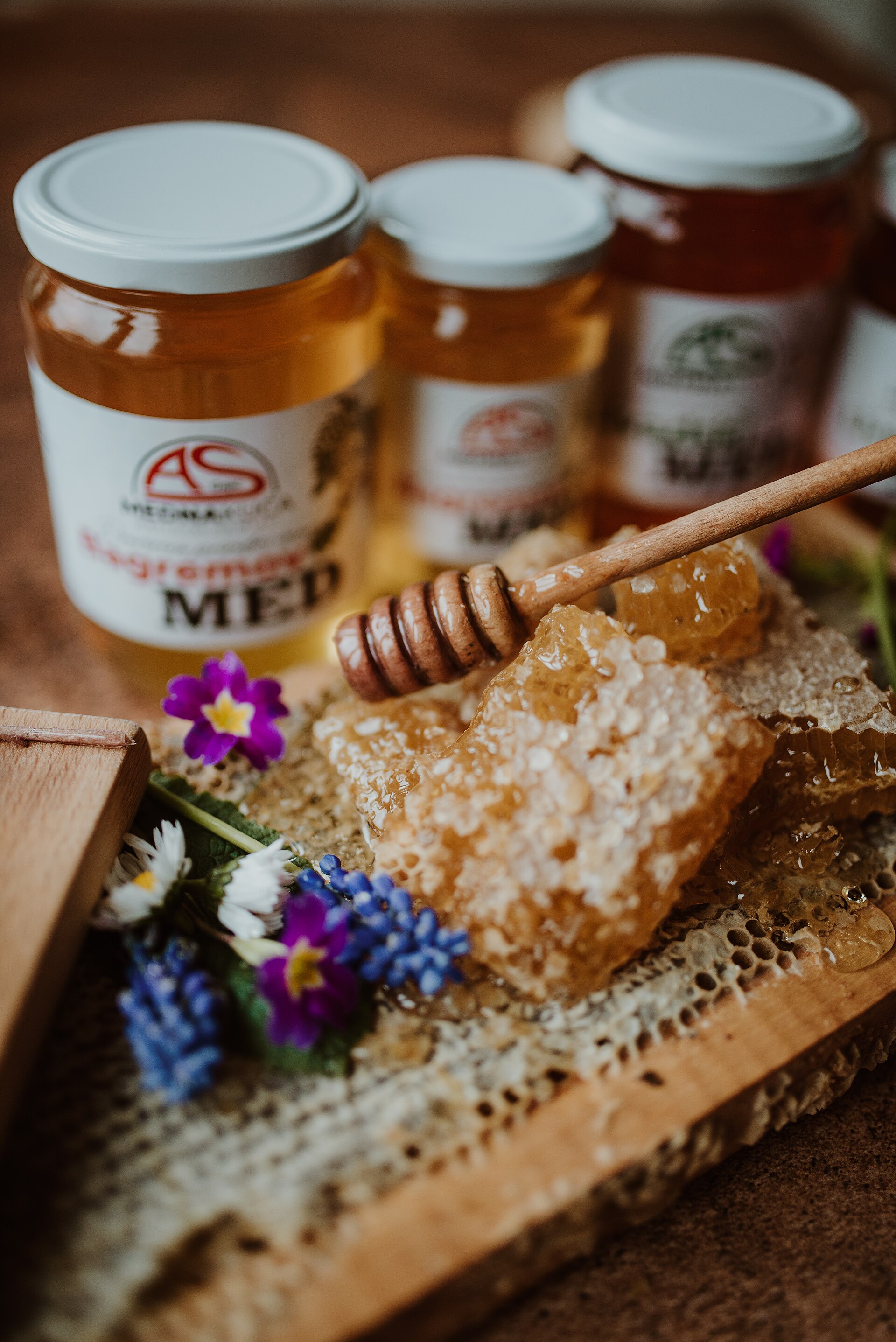 Honeycomb with a wooden dipper